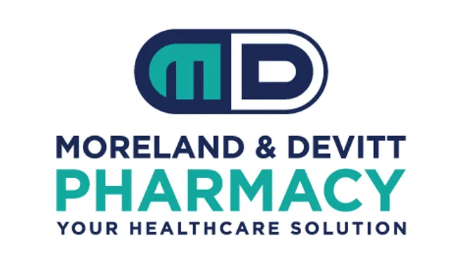 M,D in a navy and teal pill/oval shape. Text under: Moreland & Devitt Pharmacy Your healthcare solution